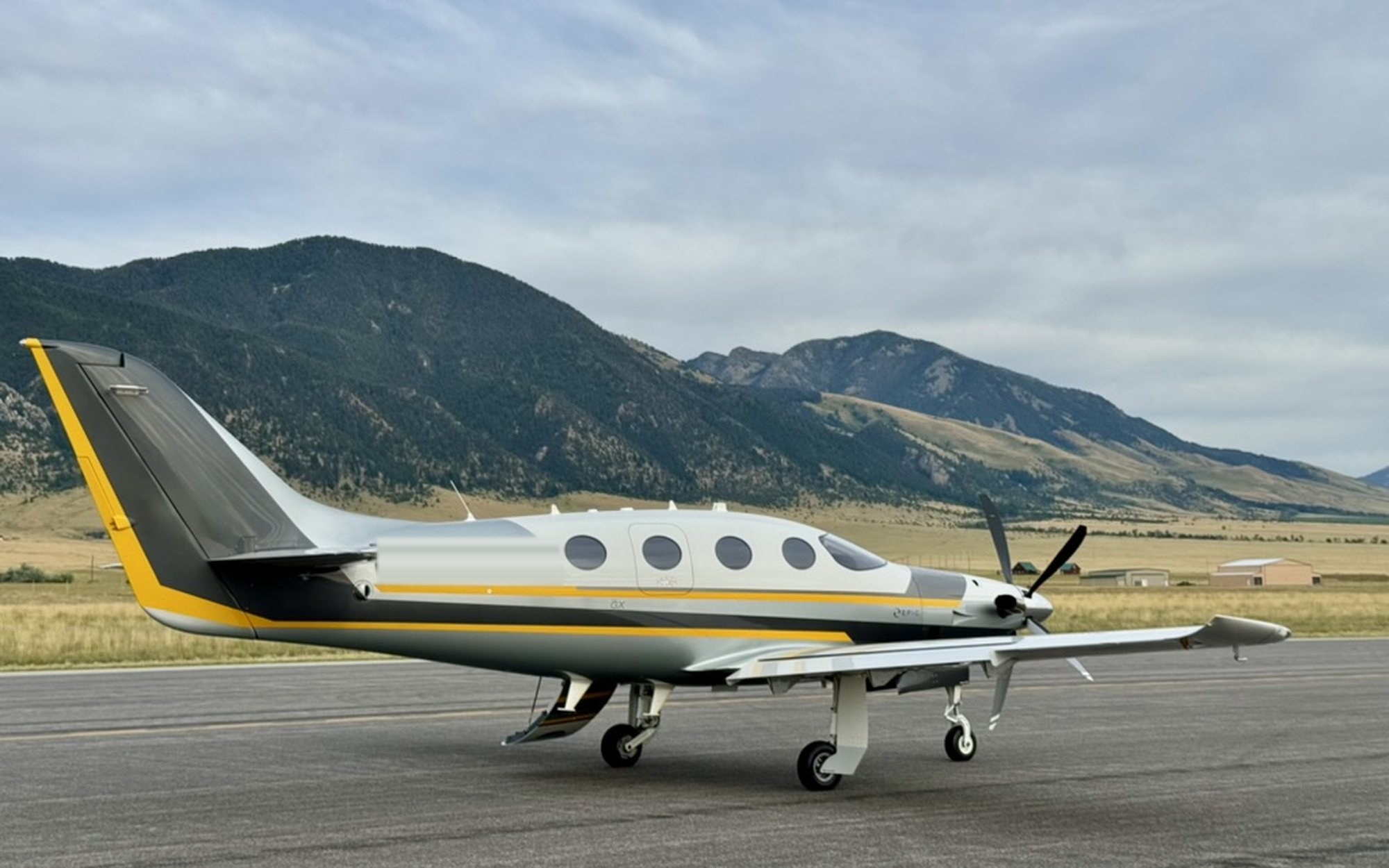 Epic E1000 GX on the ramp with mountains behind