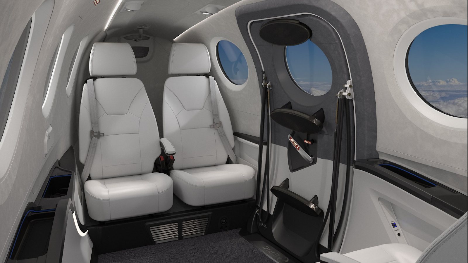 Club seating in the Epic E1000 cabin, set up as a working office